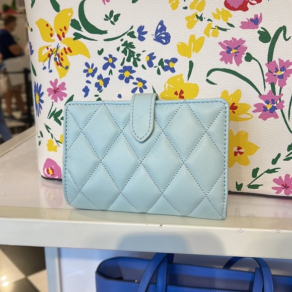 Kate Spade Carey Medium Compartment Bifold Wallet
COLOR: Turquoise - Picture 3 of 16